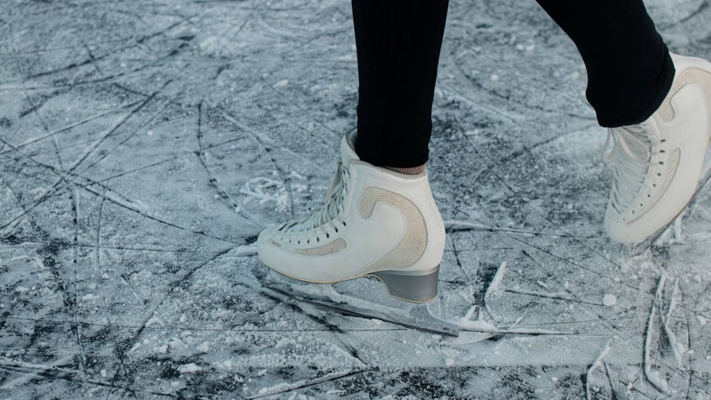 A close-up photo of a person ice skating